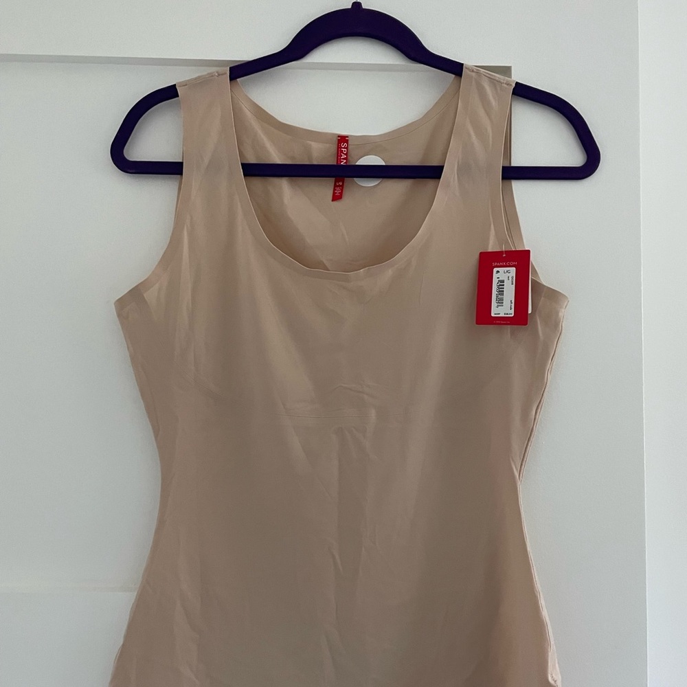 NWT Size Large Spanx tank undershirt. One black and one nude.